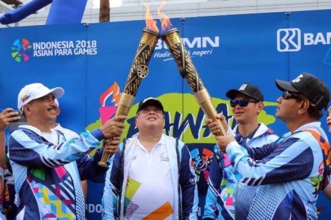  Dukung Semangat Kepada Para Atlet, BRI Ikut Meriahkan Parade Obor Asian Para Games 2018