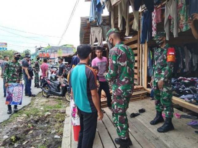 Prajurit TNI Yonif 642 Laksanakan Penerapan Prokes dan Kampanye Pencegahan Covid-19