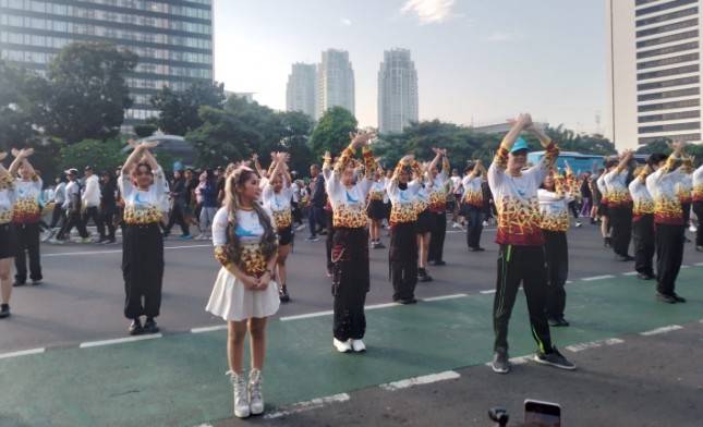 Ramaikan CFD Jakarta Aktifitas "Flash Mob" Tebarkan Perdamaian Melalui Tarian Dan Lagu 'Ru Yuan'