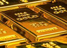 Batangan emas 999.9 fine gold untuk artikel cadangan emas dunia dari Unsplash