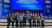 Penandatanganan MoU antara BEI dan HKI