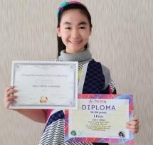 Jane Callista Dengan 2 Diploma yang menyatakan dirinya sebagai juara dalam kompetisi vokal di Spanyol dan Amerika