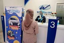Salah satu banner program undian WOMBASTIS yang tampak di salah satu gerai PT WOM Finance Tbk dalam rangka mengapresiasi konsumen setia yang telah mempercayakan pembiayaannya kepada WOM Finance. (Foto: Humas WOM Finance)