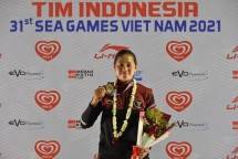 Atlet balap sepeda MTB-Downhill putri Tiara Andini Prastika baru saja mengharumkan Indonesia setelah meraih medali emas usai finis tercepat pada final run cabang olahraga balap sepeda MTB Downhill putri di SEA Games 2021 Vietnam.(foto:bagus/kemenpora.go.id)