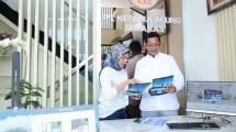 Direktur Utama PT KAS, I Wayan Madik Kesuma bersama Senior Vice President (SVP) Nonsubsidize Mortgage and Personal Lending PT Bank Tabungan Negara Tbk. Iriska Dewayani