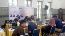 Suasana rekap nilai dan host lomba Tahfiz Al-Qur'an