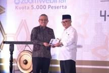 Menteri Pendidikan Dasar dan Menengah Abdul Mu'ti dan Kepala Perpustakaan Nasional E. Aminudin Aziz.